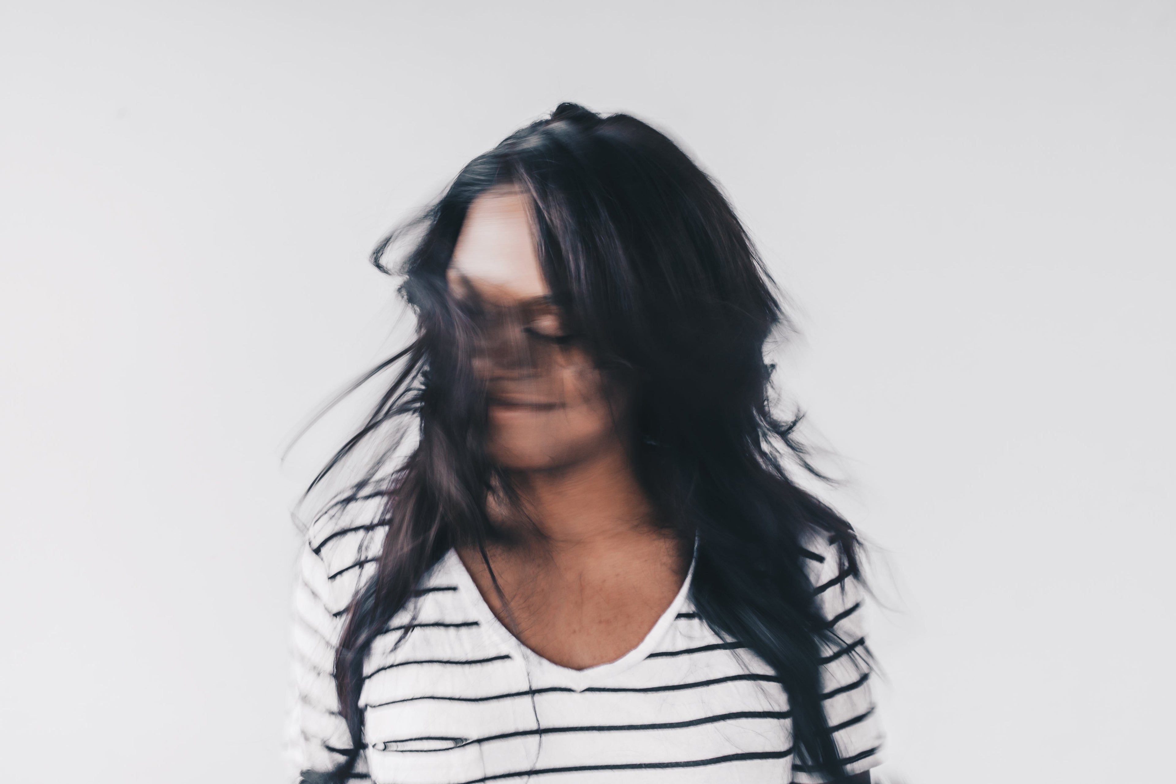 a-woman-tosses-her-hair