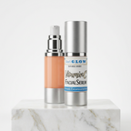 Simple Glow Bright 15% Vitamin C Facial Serum in airless pump bottles on a marble block